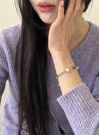 OFUSE - Pearl Drop Bracelet (Cross)